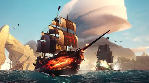 A pirate ship with a flaming skin in Sea of Thieves.