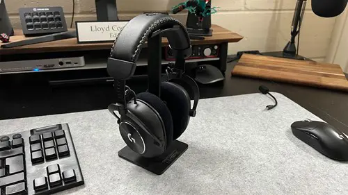 Logitech G PRO X 2 on a headphone stand on a desk