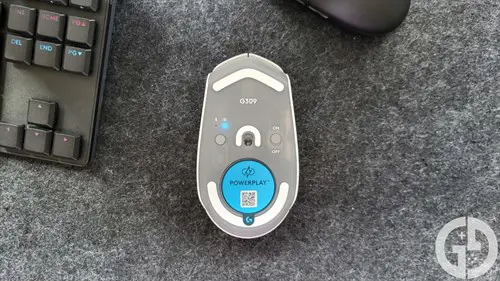 Image of the underside of the Logitech G309 gaming mouse