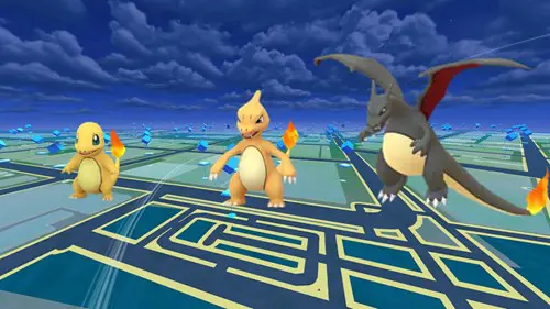 Shiny Charmander, Charmeleon, and Charizard in Pokemon GO, which can be caught at the Community Day Classic