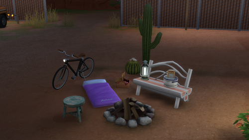 Rotated objects by a campfire in The Sims 4