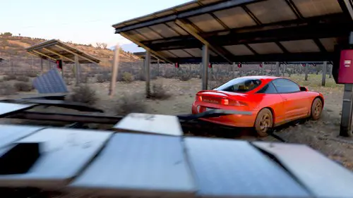 A car smashing through Forza Horizon solar panels.