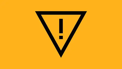 An exclamation point inside an upside down triangle on a yellow background.