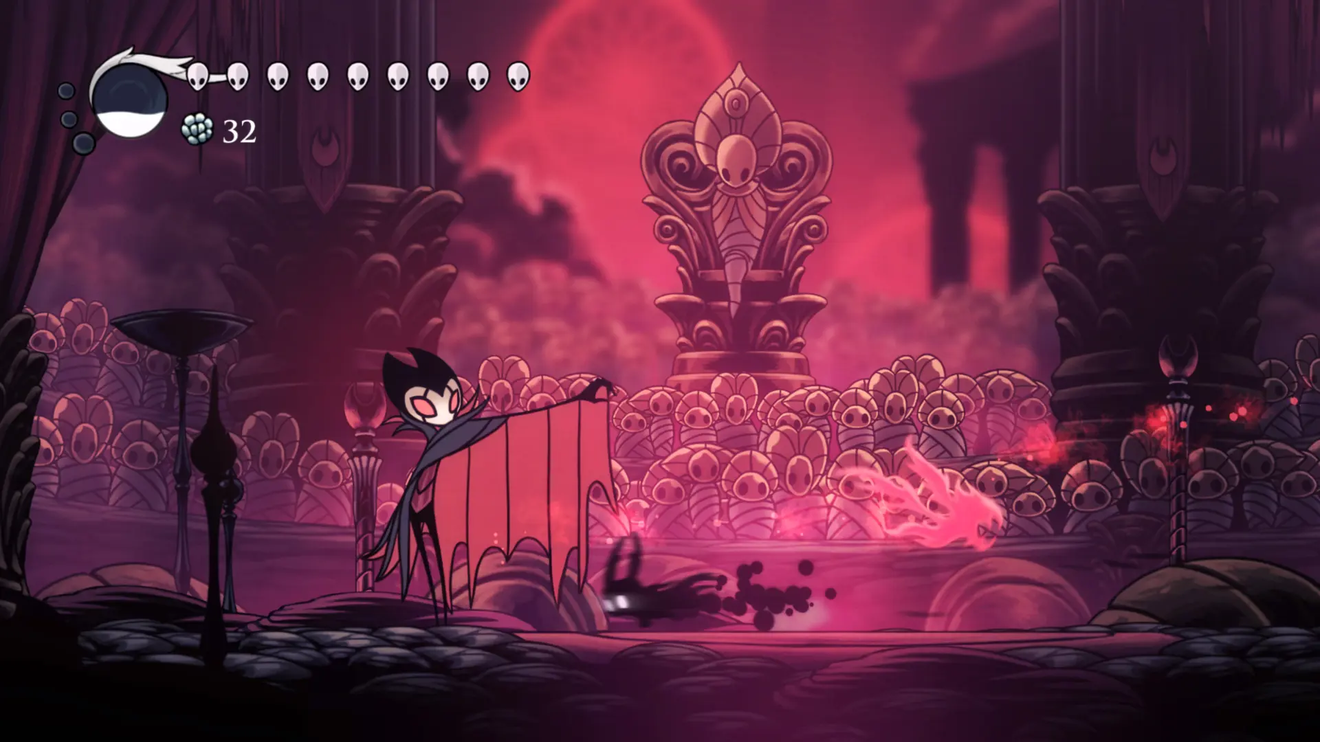 A boss fight in Hollow Knight.