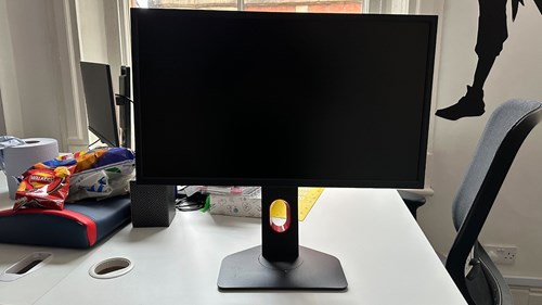 BenQ ZOWIE XL2546K monitor on a desk in the GGRecon offices