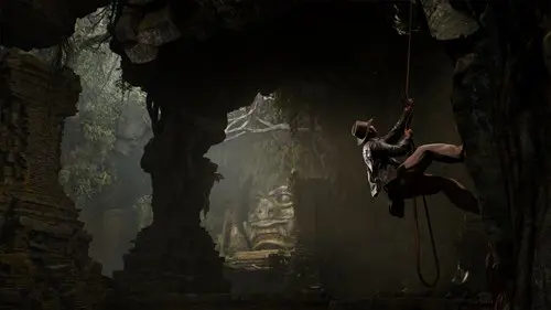 Image of Indy climbing in a cave in Indiana Jones and the Great Circle