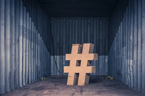 A "hashtag" icon made of wood.